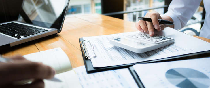 2 people reviewing paperwork