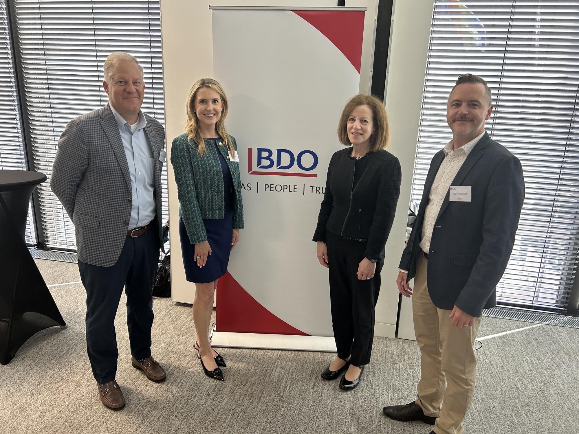 group-of-people-beside-bdo-banner-tp-event