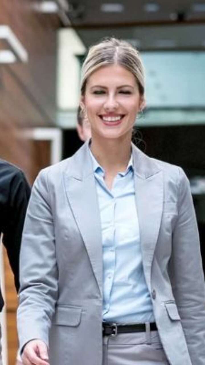 people-in-office-attire-walking-toeards-camera