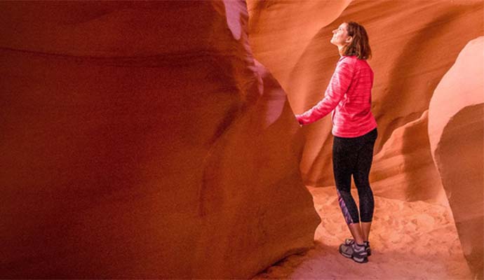 woman-in-red-canyon-smiling