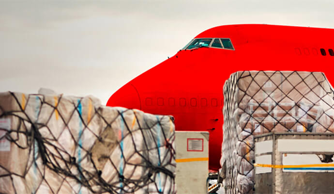international-trade-red-airplane-and-pallets-of-parcels-bdo