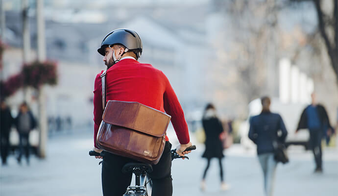 man-with-beard-and-red-jumper-on-bike-from-behind-bdo