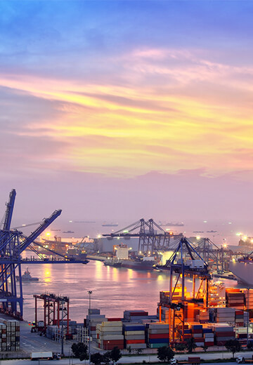 loading-harbour-with-open-cargo-storage-areas-at-sunset-bdo