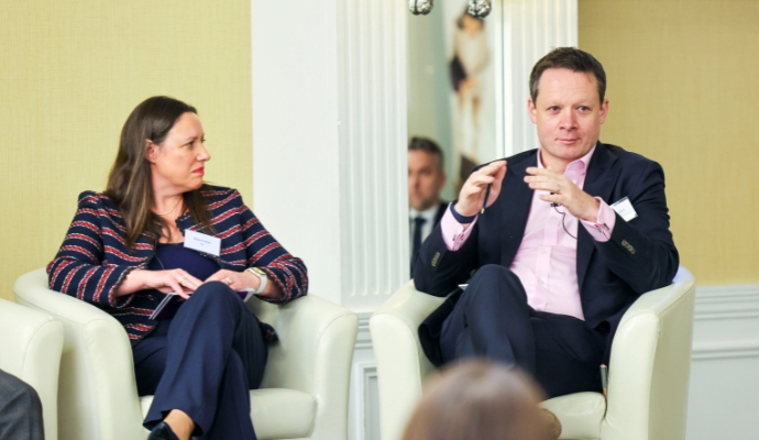 2-people-on-stage-at-Senior-financial-services-leaders-convene-in-shelbourne-Dublin-690-x4