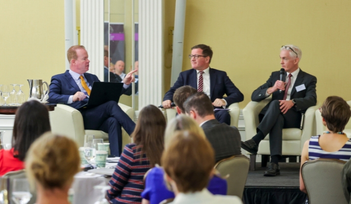3-people-on-stage-at-Senior-financial-services-leaders-convene-in-shelbourne-Dublin-690-x4