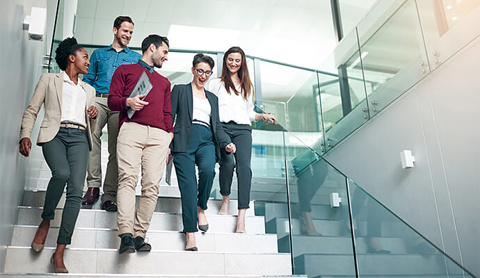 people-in-office-apparel-walking-down-the-stairs-office