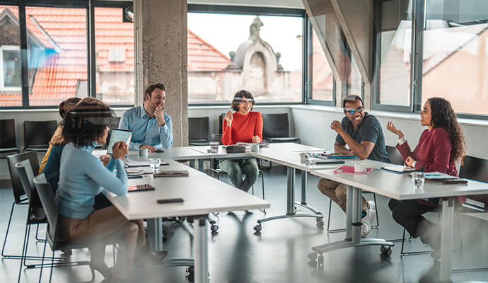 people-in-the-conference-room-through-glass-reflection-bdo