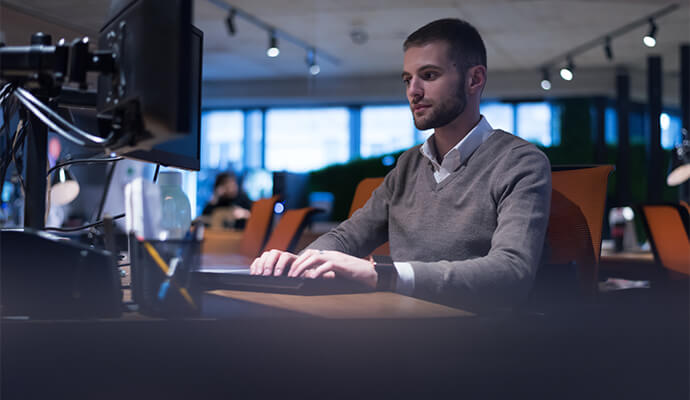 man-typing-on-computer-office-setting-bdo