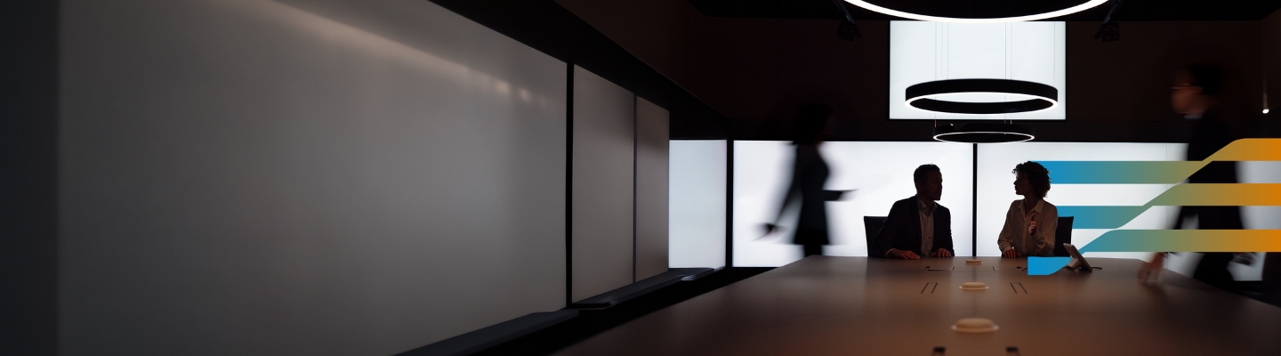 man-and-woman-in-office-blurred-motion
