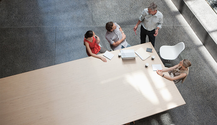 team-discussing-over-table-bdo