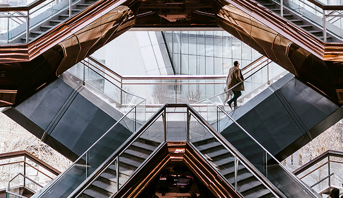 man-walking-up-stairs